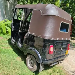 Bajaj RE 2014