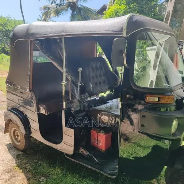Bajaj RE 2014