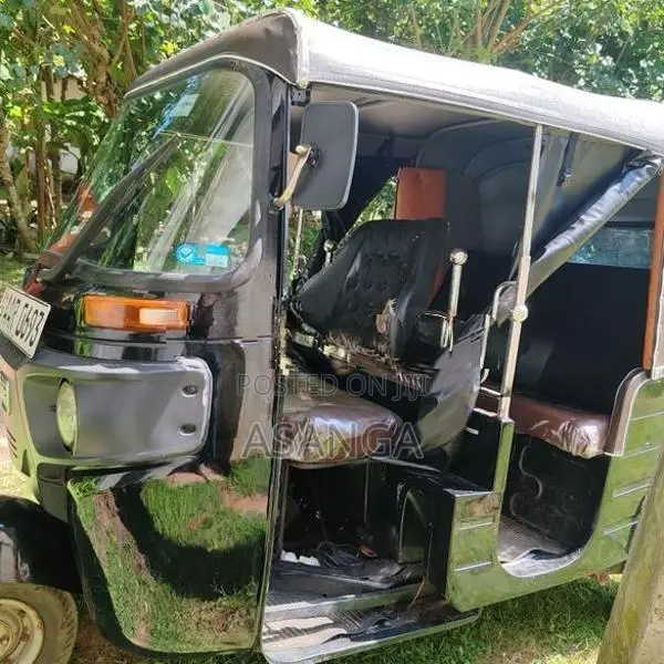 Bajaj RE 2014