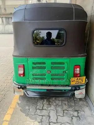 Bajaj RE 2014