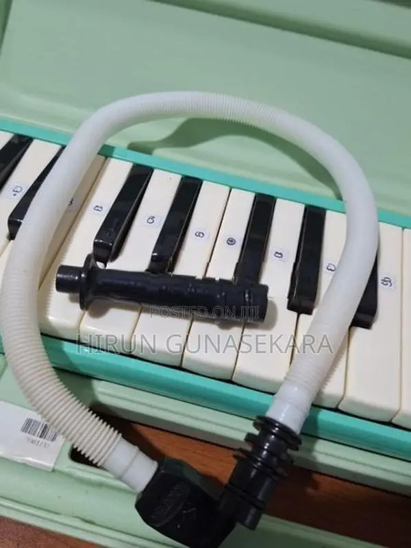 Suzuki Melodion MX-32D