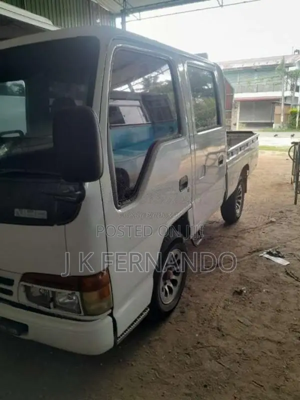 Isuzu ELF 1980 Crew Cab (Used)