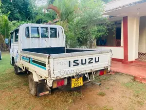 Isuzu ELF 1998 Crew Cab (Used)