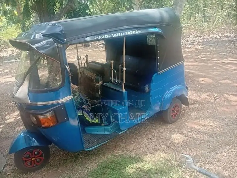 Bajaj RE 2013