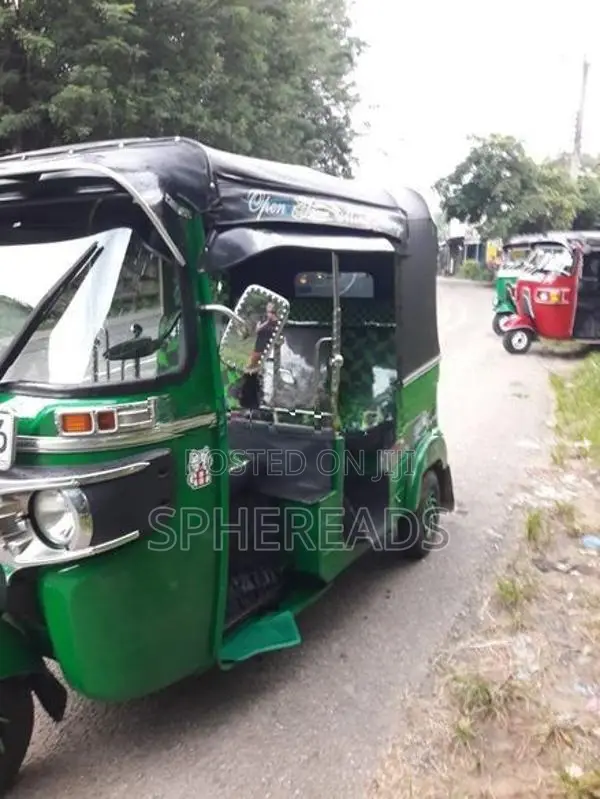 Bajaj RE 4 Stroke 2014