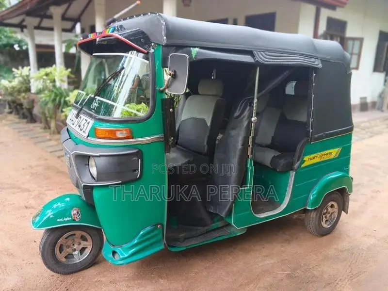 Bajaj RE 2014