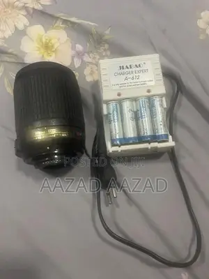 Nikon 55-200mm Lens With Flash Light Battery Charger