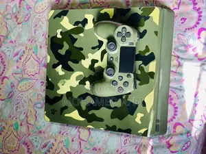 Sony Ps4 1TB Console With Controller ( Camo Edition )