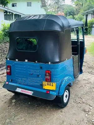 Bajaj RE 2013