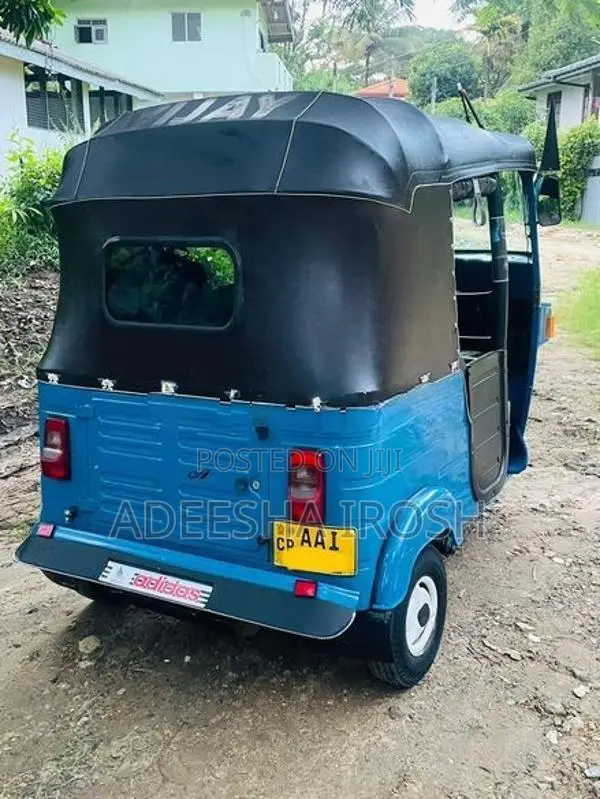 Bajaj RE 2013
