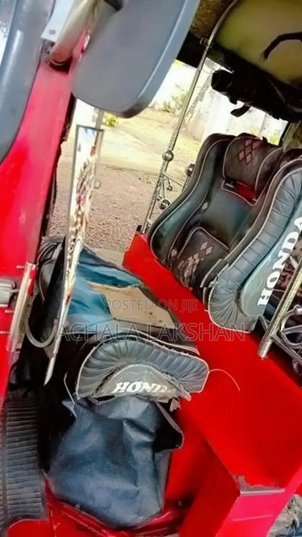Bajaj RE 2014