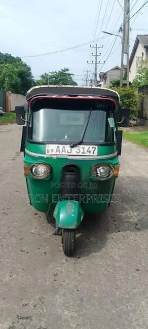 Bajaj RE 2013