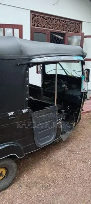 Bajaj RE 2013