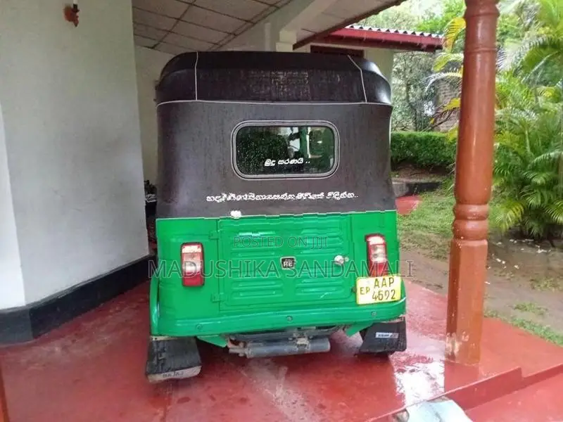 Bajaj RE 2014