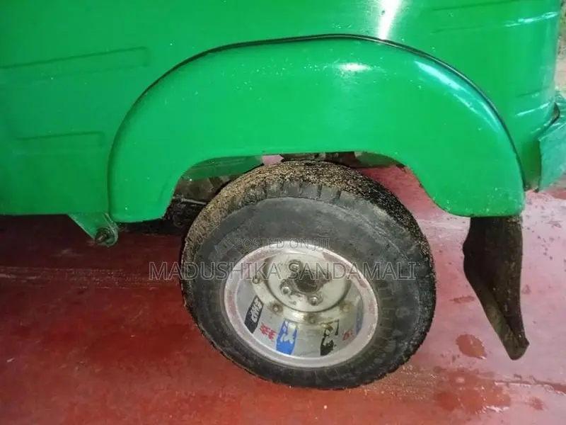 Bajaj RE 2014