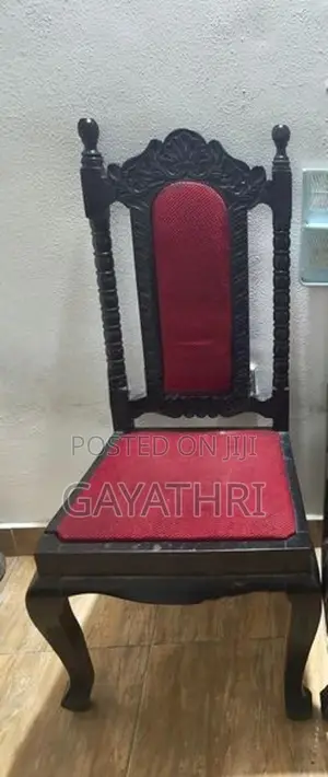 Antique Wooden Chair With Carved Design - Red Cushion