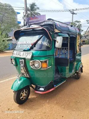 Bajaj RE 2013