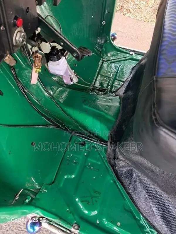 Bajaj RE 2013