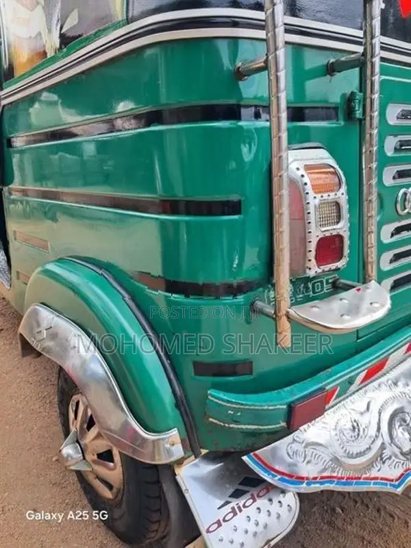 Bajaj RE 2013
