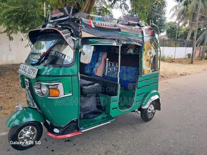 Bajaj RE 2013
