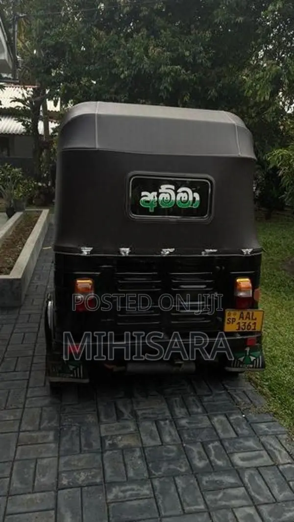 Bajaj RE 2014