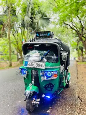 Bajaj RE 2013
