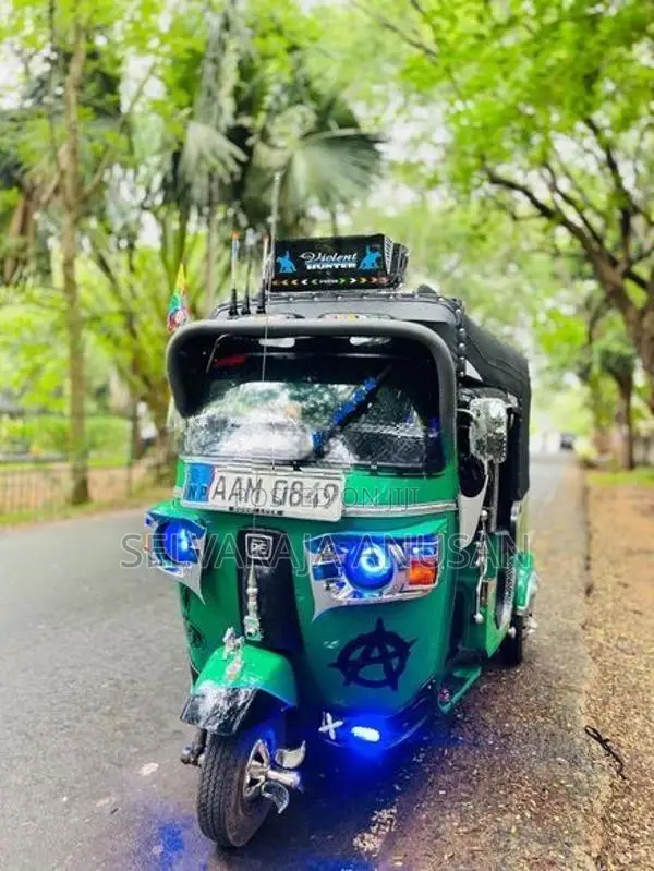 Bajaj RE 2013