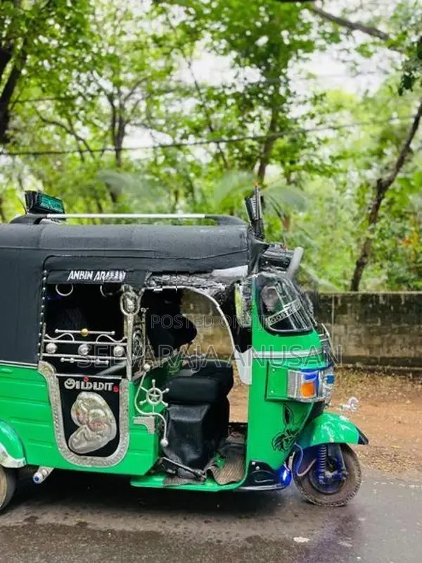 Bajaj RE 2013