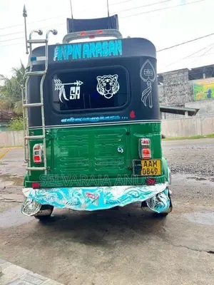 Bajaj RE 2013