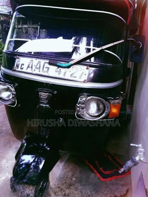 Bajaj RE 2013