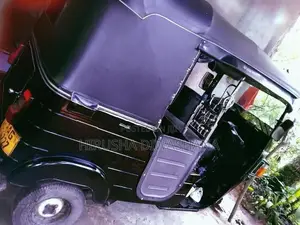 Bajaj RE 2013