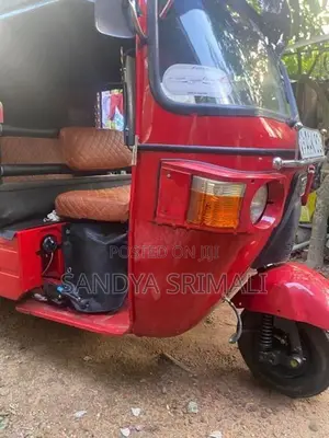 Bajaj RE 2013