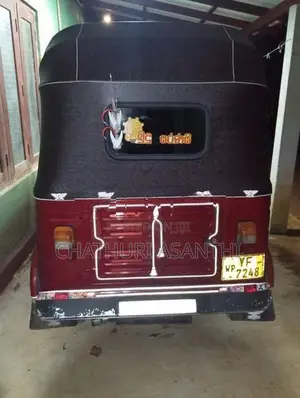 Bajaj RE 2013