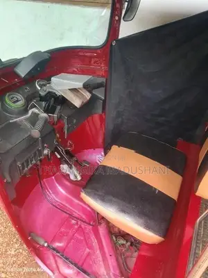 Bajaj RE 2011
