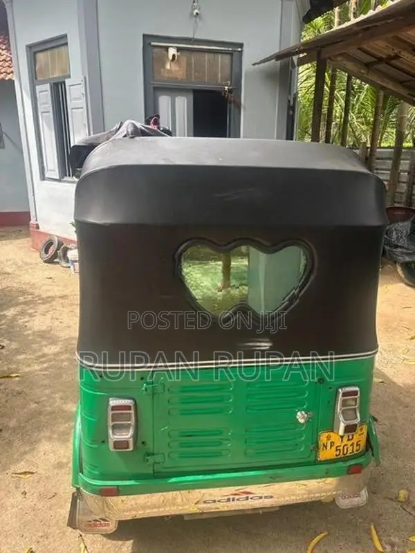 Bajaj RE 2014