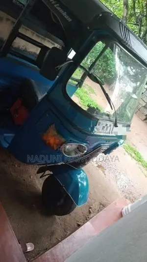 Bajaj RE 2013