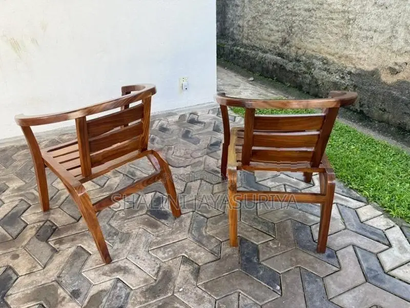 E H Cooray 2 Sitting Chairs