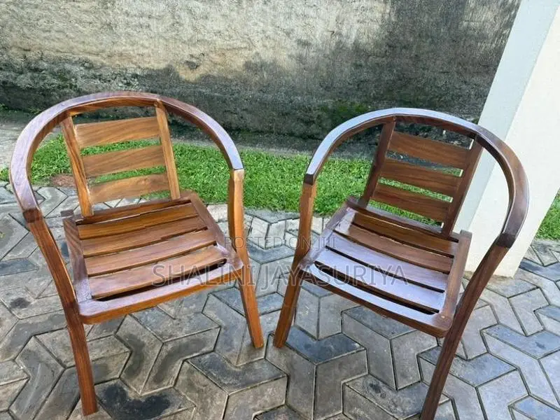 E H Cooray 2 Sitting Chairs