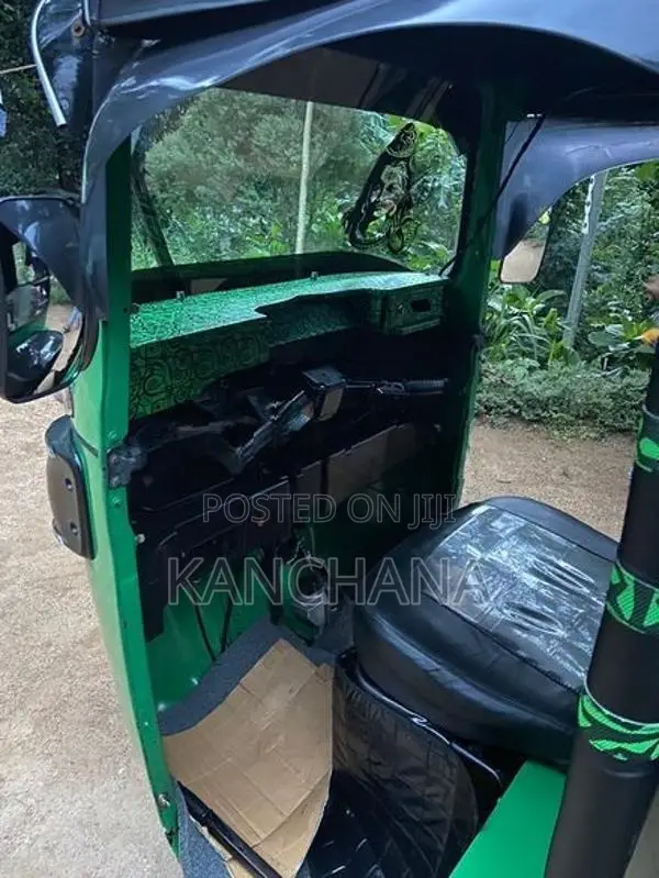 Bajaj RE 2014