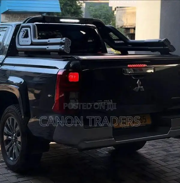 Mitsubishi Triton Hamer Electric Roll Shutter & Night Fury Bar
