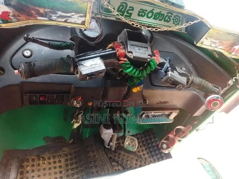 Bajaj RE 2014
