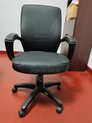Used Damro Conference Table With 8 Low-Back Chairs.