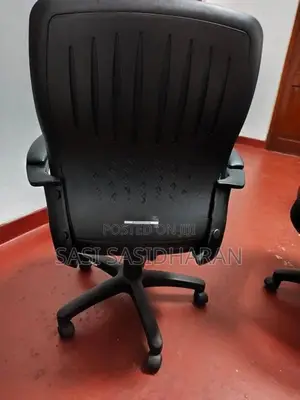 Used Damro Conference Table With 8 Low-Back Chairs.