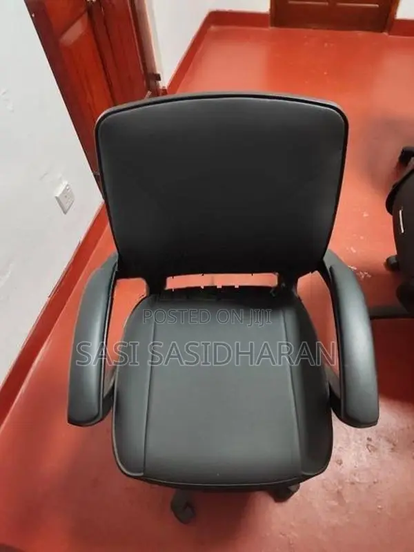 Used Damro Conference Table With 8 Low-Back Chairs.