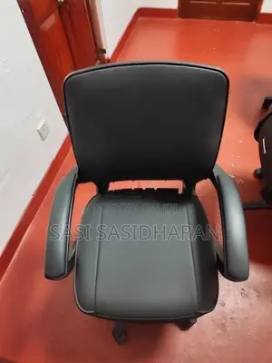 Used Damro Conference Table With 8 Low-Back Chairs.