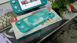 Turquoise Nintendo Switch Lite With Animal Crossing