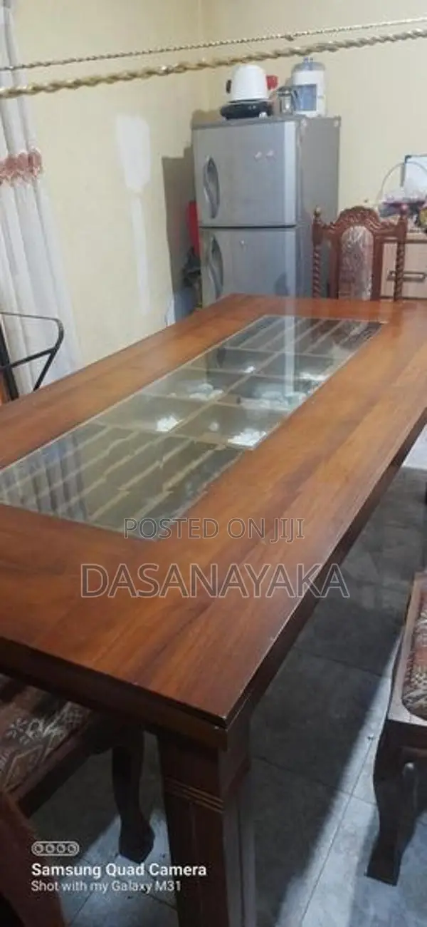 Teak Dining Table (තේක්ක කෑම මේසයක්)