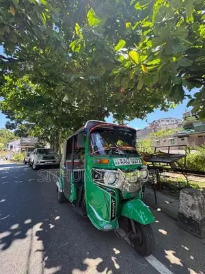 Bajaj RE 2014
