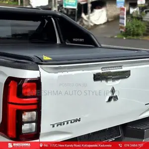 MITSUBISHI TRITON ROLLER SHUTTER MANUAL / ELECTRIC