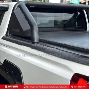 MITSUBISHI TRITON ROLLER SHUTTER MANUAL / ELECTRIC